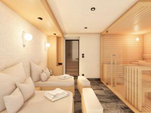 a room with two white couches and a shower at Chalet moderne avec sauna et jacuzzi à Courchevel pour 8 adultes et 5 enfants - FR-1-562-89 in Courchevel +5 photos
