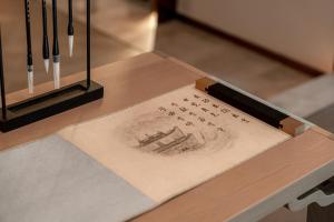a drawing of a boat on a table at Zunjing Boutique Hotel Nanjing Confucius Temple in Nanjing