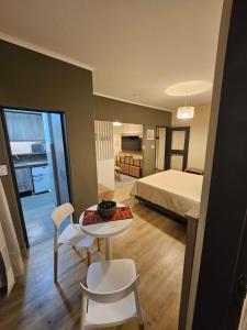 Ένα ή περισσότερα κρεβάτια σε δωμάτιο στο Apart Ejecutivo Centrico a 10m de la Catedral Tango 08