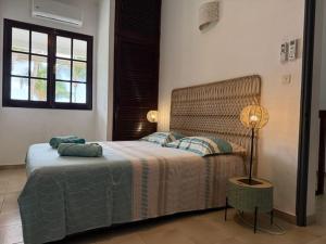 Postel nebo postele na pokoji v ubytování Villa Coco des sables accès direct au lagon