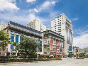 a group of tall buildings in a city at City Comfort Inn Yangjiang High-tech Zone Pinggang in Yangjiang