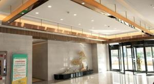 a lobby of a building with a museum at Gya Hotel Tangshan Qian'an Fortune Center in Qian'an