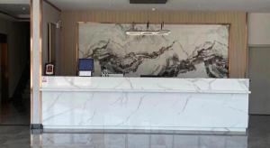 Ο χώρος του λόμπι ή της ρεσεψιόν στο Shell Hotel Huai'an Zhuqiao Industrial Park