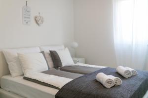 Postel nebo postele na pokoji v ubytování Villa Pjena