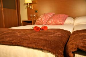 Łóżko lub łóżka w pokoju w obiekcie Oca Ipanema Hotel