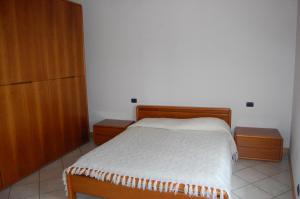 Casella's Apartments tesisinde bir odada yatak veya yataklar