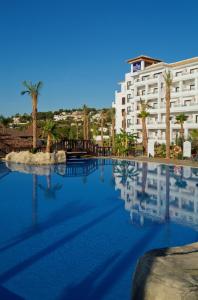 a large swimming pool in front of a hotel at SH Villa Gadea in Altea