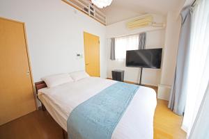 TV/trung tâm giải trí tại goom Hotel Nakasu Maxim