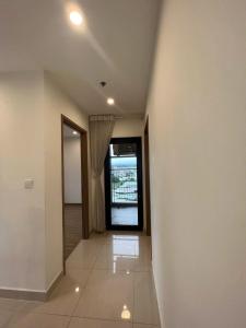 a living room with a bench in front of a window at Noi Bai Airport in Hanoi