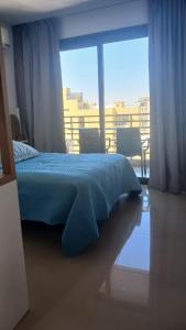 Ένα ή περισσότερα κρεβάτια σε δωμάτιο στο Ojo Turco Monoambiente Temporario +23 φωτογραφίες