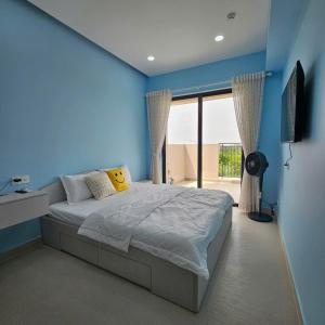 Ένα ή περισσότερα κρεβάτια σε δωμάτιο στο Swanbay Le Center Zone 6