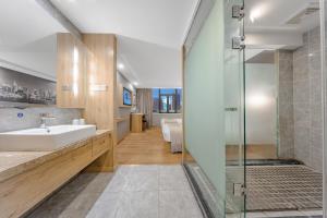 Ένα μπάνιο στο Zhuo Ao Hotel
