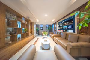 Χώρος καθιστικού στο Zhuo Ao Hotel