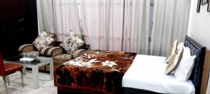 Postel nebo postele na pokoji v ubytování Hotel O Keptown