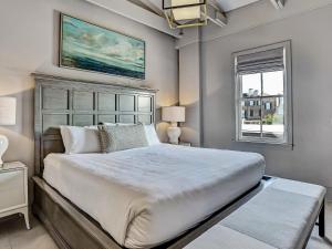 a bedroom with a large bed and a window at Parker's Collection - 8 Bedroom in Savannah +53 photos