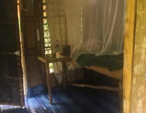 Katil atau katil-katil dalam bilik di PNGFE Nagu Home-stay & Tours