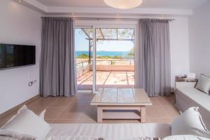 A television and/or entertainment centre at Villa-Palaiochora