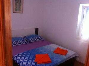 Postel nebo postele na pokoji v ubytování Apartment Luna