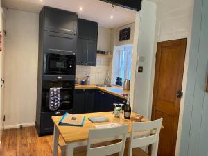 Køkken eller tekøkken på Darnholm Cottage