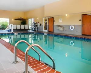 a large swimming pool in a hotel at Comfort Suites in French Lick