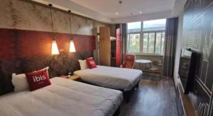 เตียงในห้องที่ ibis Xian Lintong Huaqing Hot Spring Hotel +140 ภาพ