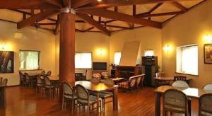 a large room with tables and chairs in it at Yumekiko in Nasushiobara