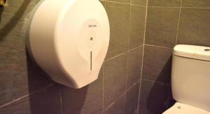 a toilet paper dispenser on the wall of a bathroom at THE ROOM2 @ Zishi in Kota Bharu +74 photos