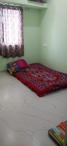 Voodi või voodid majutusasutuse Mishras Bunglow toas