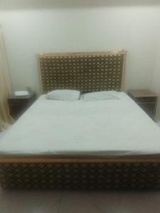 Ένα ή περισσότερα κρεβάτια σε δωμάτιο στο Mall City hotel +2 φωτογραφίες