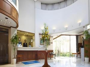 a lobby of a hospital with a reception desk at Pearl Hotel Mizonokuchi in Yokohama