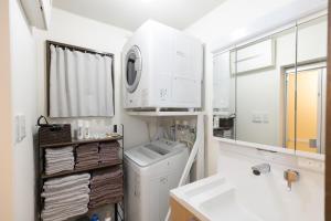 Ένα μπάνιο στο 戸建て貸切 無料駐車場有 名古屋城まで車で10分 +43 φωτογραφίες