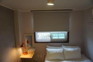 Grim Garden Guesthouse客房内的一张或多张床位