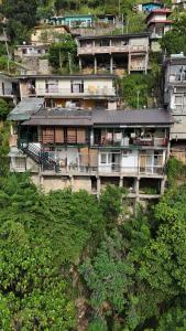 an overhead view of a building on a hill at Kandy Dilruk Homestay in Kandy