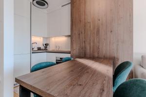 Η κουζίνα ή μικρή κουζίνα στο FORESTA Apartment Jahorina +14 φωτογραφίες