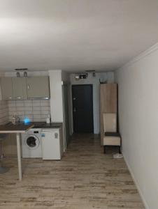 Η κουζίνα ή μικρή κουζίνα στο Studio apartament