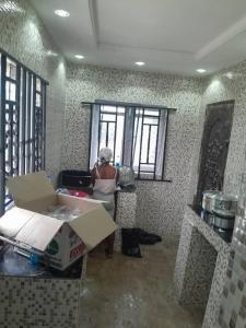 Ένα ή περισσότερα κρεβάτια σε δωμάτιο στο Cozy 3-Bedroom Tradebybata Guest House FUNAAB