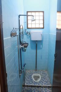 Ένα μπάνιο στο Shaja Homestay