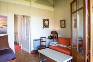 Posezení v ubytování Maison de Mézos
