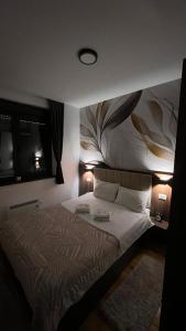 Ένα ή περισσότερα κρεβάτια σε δωμάτιο στο Avalon Titova Vila +17 φωτογραφίες