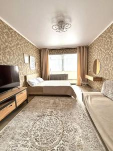 Televisyen dan/atau pusat hiburan di Arte Apartment