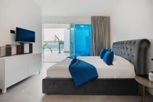 Ένα ή περισσότερα κρεβάτια σε δωμάτιο στο Laguna Blu +27 φωτογραφίες