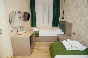 Ένα ή περισσότερα κρεβάτια σε δωμάτιο στο Hotel Neon +114 φωτογραφίες