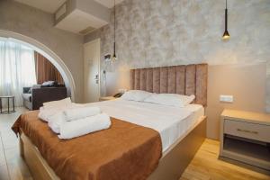 Ένα ή περισσότερα κρεβάτια σε δωμάτιο στο Hotel Neon