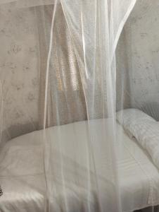 Ένα ή περισσότερα κρεβάτια σε δωμάτιο στο Kikambala eco villas