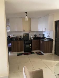 Η κουζίνα ή μικρή κουζίνα στο Le rose