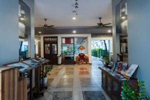 a store with a large glass door and a lobby at Green Amazon Residence in Siem Reap +106 photos