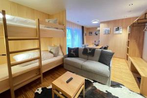 Ένα ή περισσότερα κρεβάτια σε δωμάτιο στο ALPtyrol-Sennerei