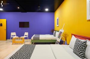 Χώρος καθιστικού στο Frida Nest By Privy Stays, Alibag