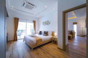 Postel nebo postele na pokoji v ubytování New Private Pool Villa with 3BR - MV77 + 51 fotografií