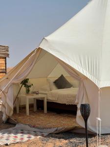 Postel nebo postele na pokoji v ubytování Quiet Nights Camp